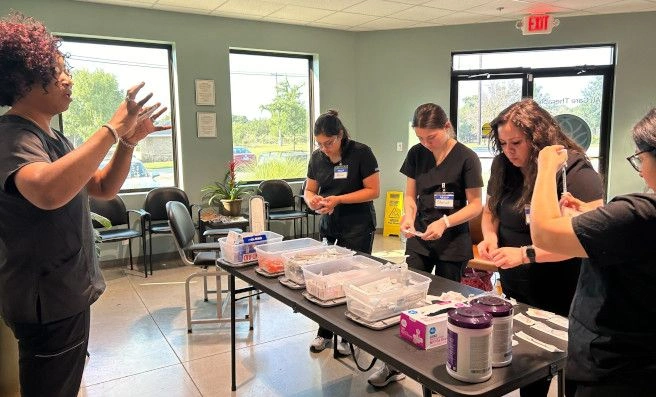 instructor verbally instructing students procedure steps instructor verbally instructing students procedure steps