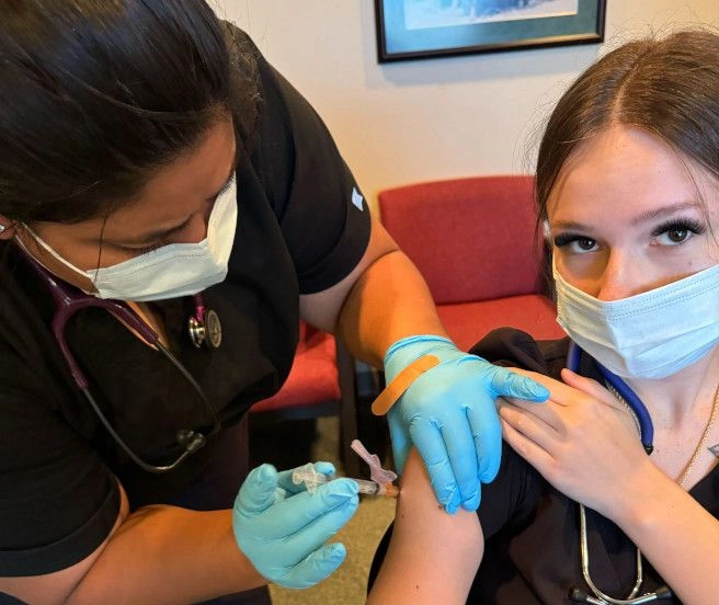 students training to administor blood draws students training to administor blood draws